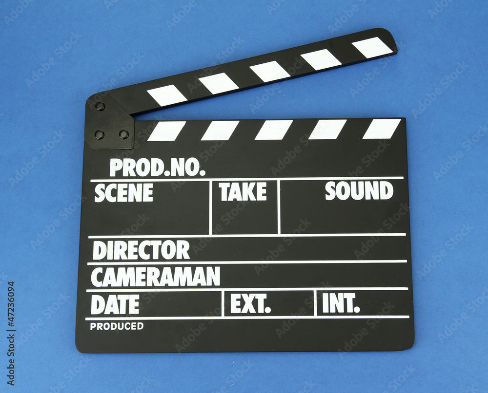 Movie production clapper board on color background