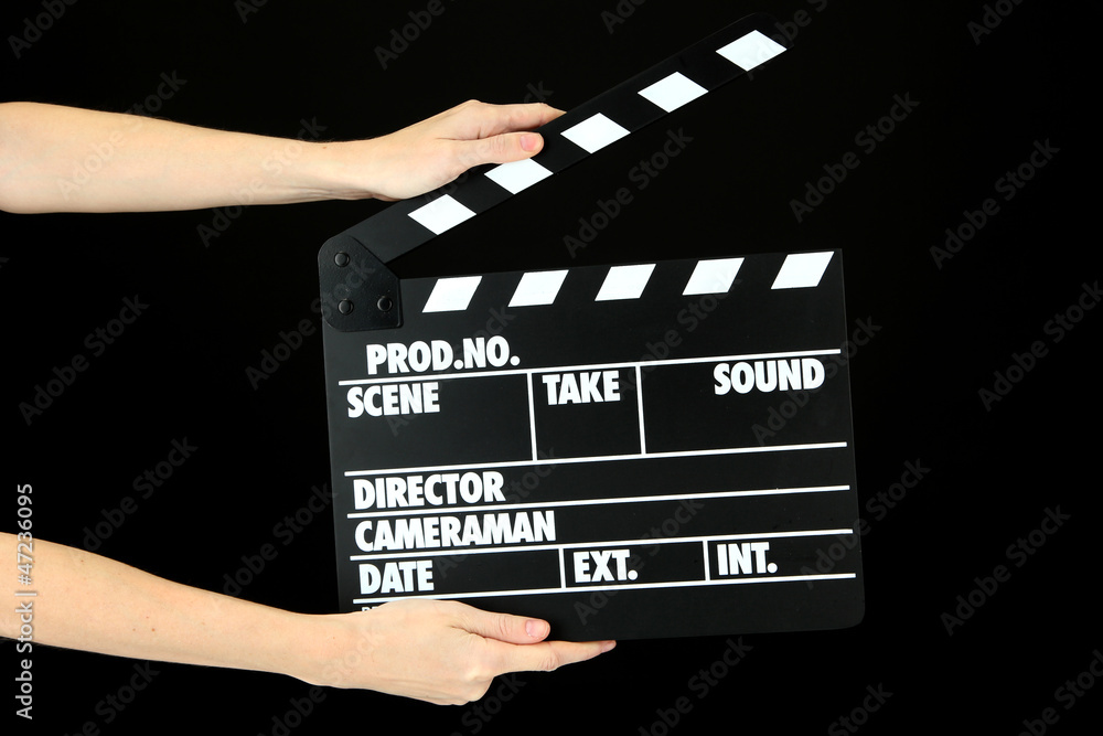 Movie production clapper board isolated on black