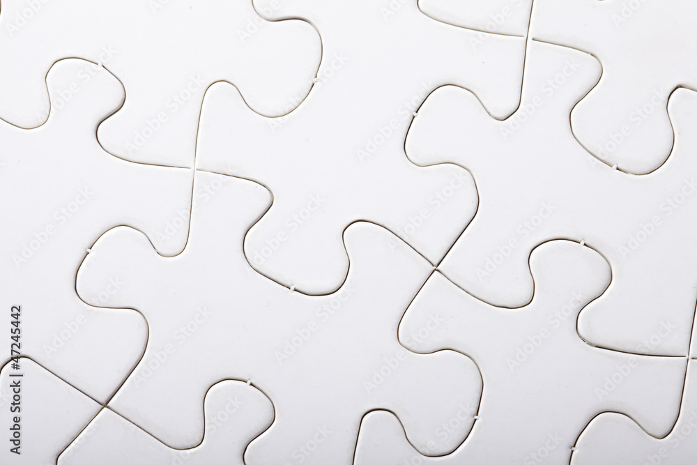 Jigsaw puzzle with blank white pieces Jigsaw puzzle with blank white pieces