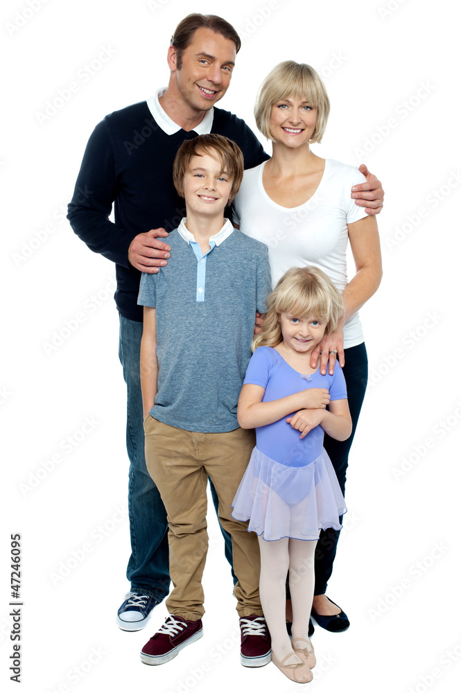 Indoor studio shot of lovely family, four members Indoor studio shot of lovely family, four members