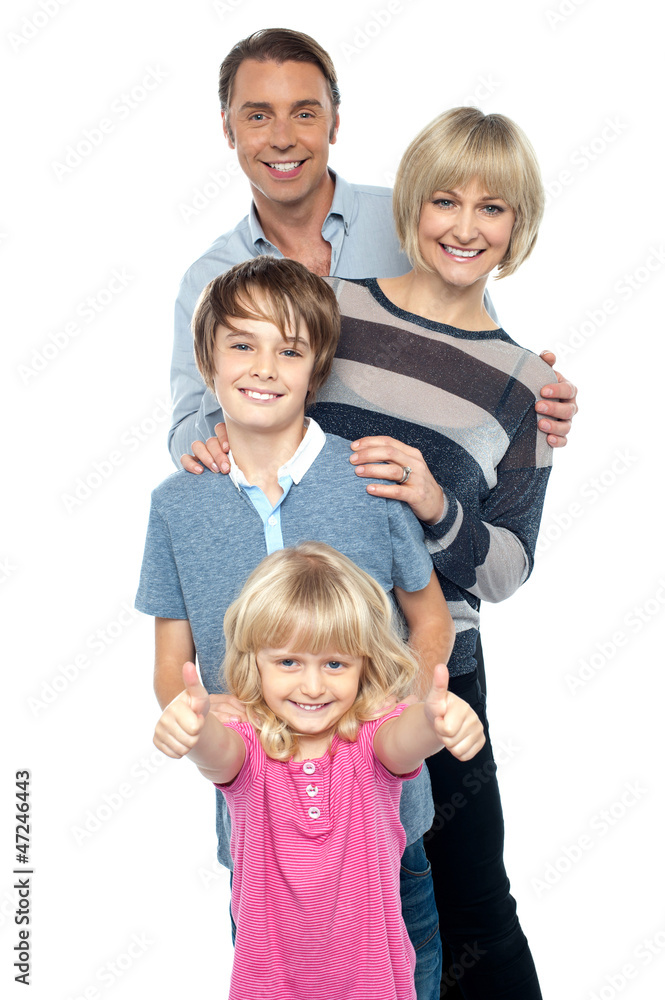 Group portrait of a playful family of four Group portrait of a playful family of four