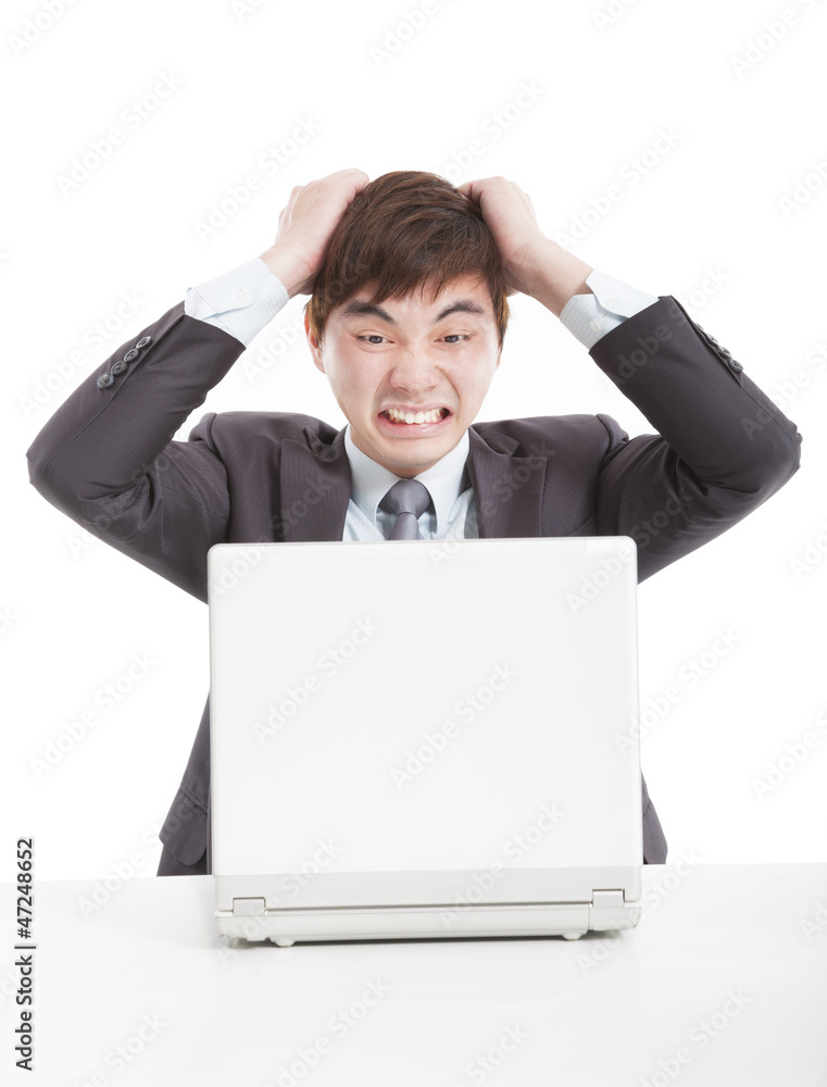 frustrated businessman with a laptop frustrated businessman with a laptop