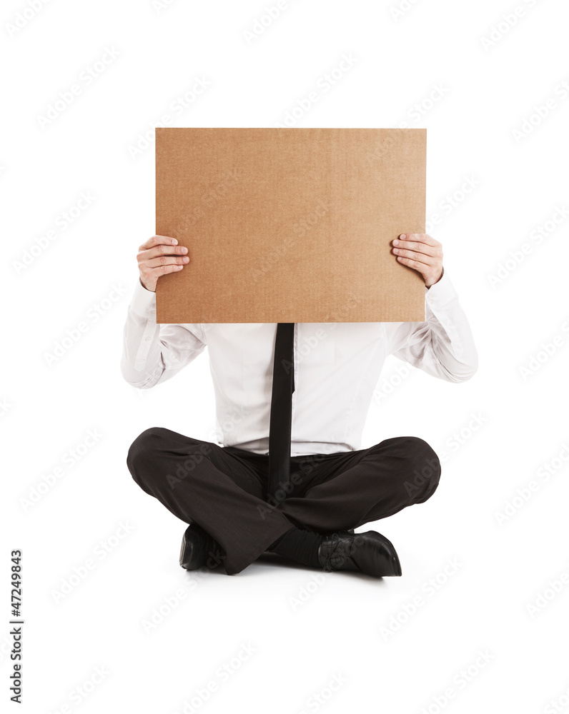 Man holding on his face cardboard
