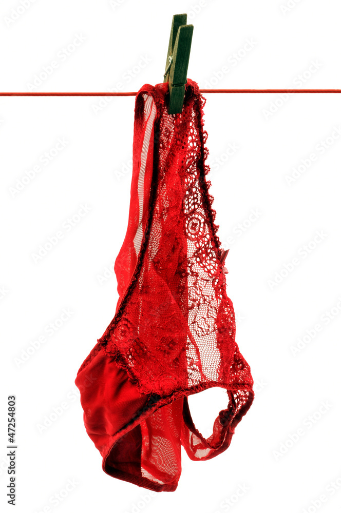 Petite culotte rouge sur un fil à linge Stock Photo | Adobe Stock