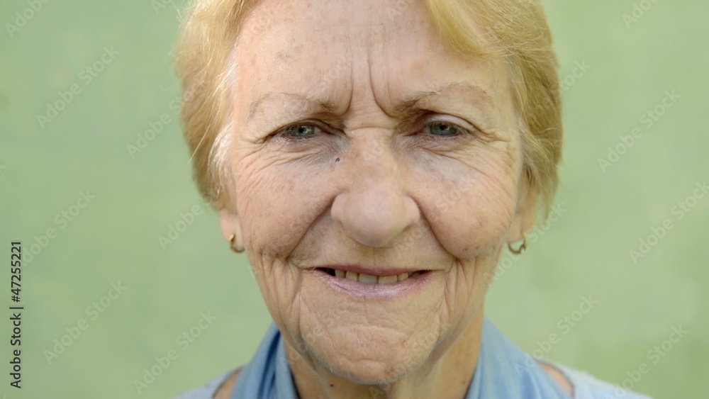 Happy old people, senior blonde woman looking at camera Happy old people, senior blonde woman looking at camera