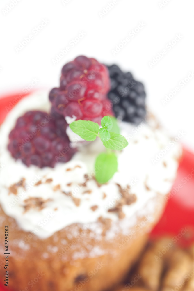 muffin with whipped cream,mint, raspberries, blackberries and nu muffin with whipped cream,mint, raspberries, blackberries and nu