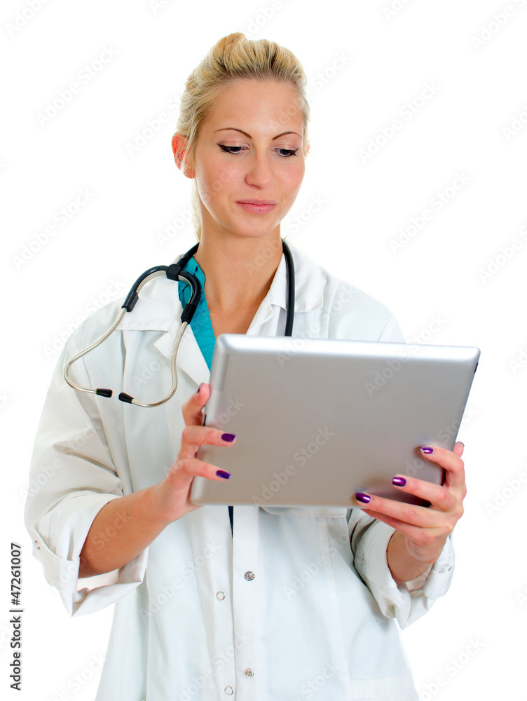 Young female doctor using tablet computer. Isolated on white Young female doctor using tablet computer. Isolated on white