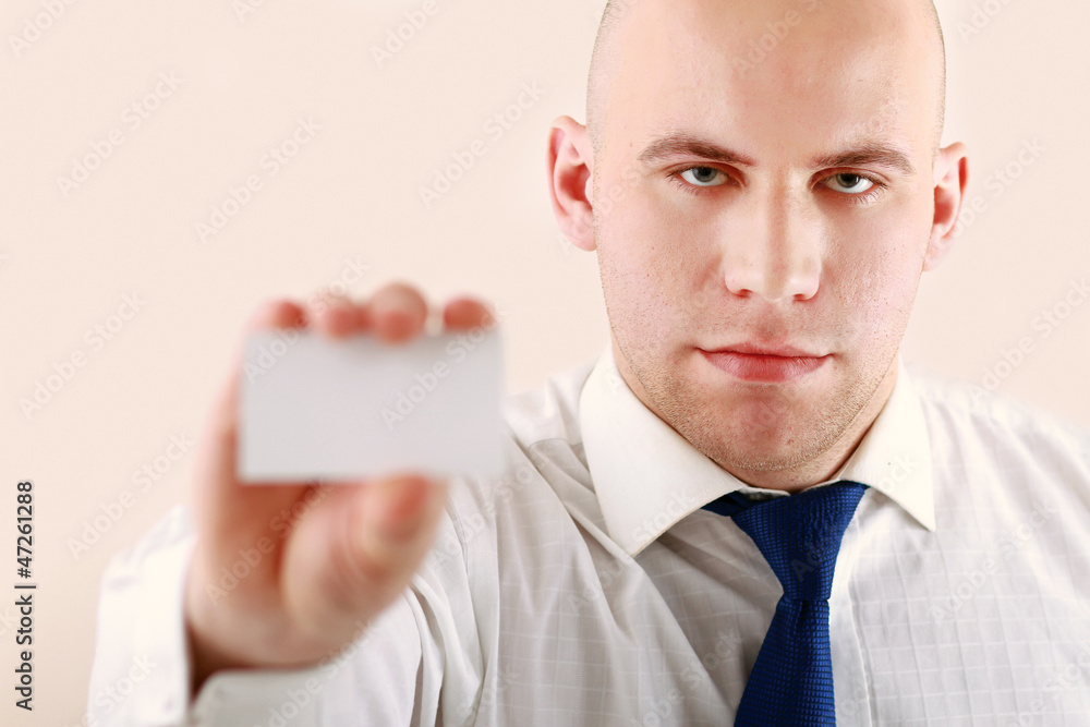 A businessman showing an empty card A businessman showing an empty card