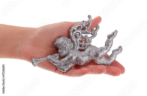 Glitter Christmas Angel toy in hand isolated on white