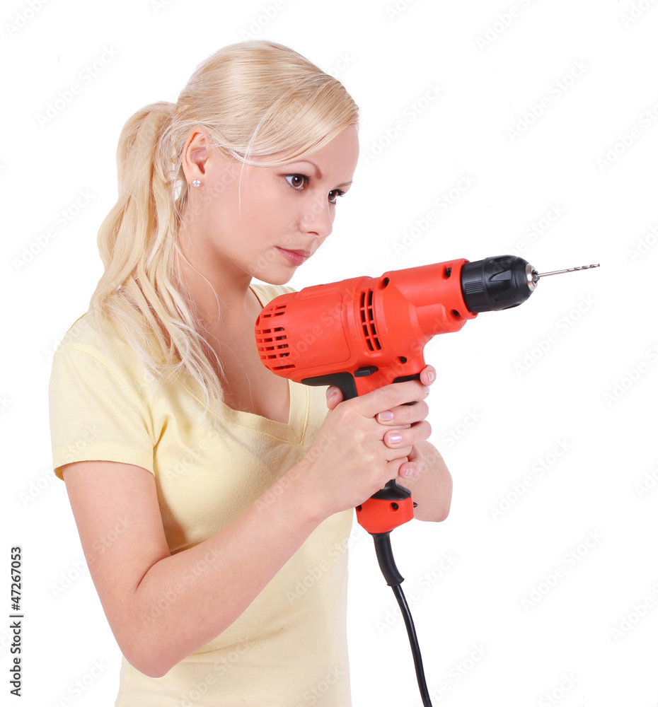 blonde girl with drill, isolated on white blonde girl with drill, isolated on white