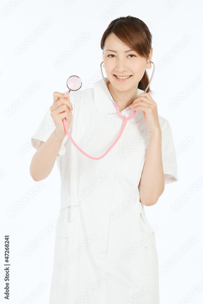 Beautiful young nurse on white background Beautiful young nurse on white background