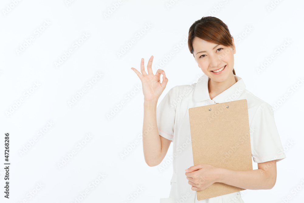 Beautiful young nurse on white background Beautiful young nurse on white background