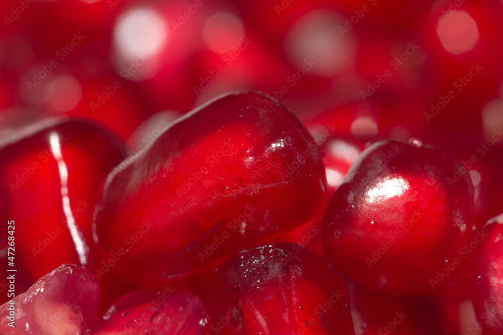 juicy ripe red pomegranate. macro juicy ripe red pomegranate. macro