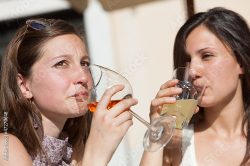 Two Young Women with a Cold Drink