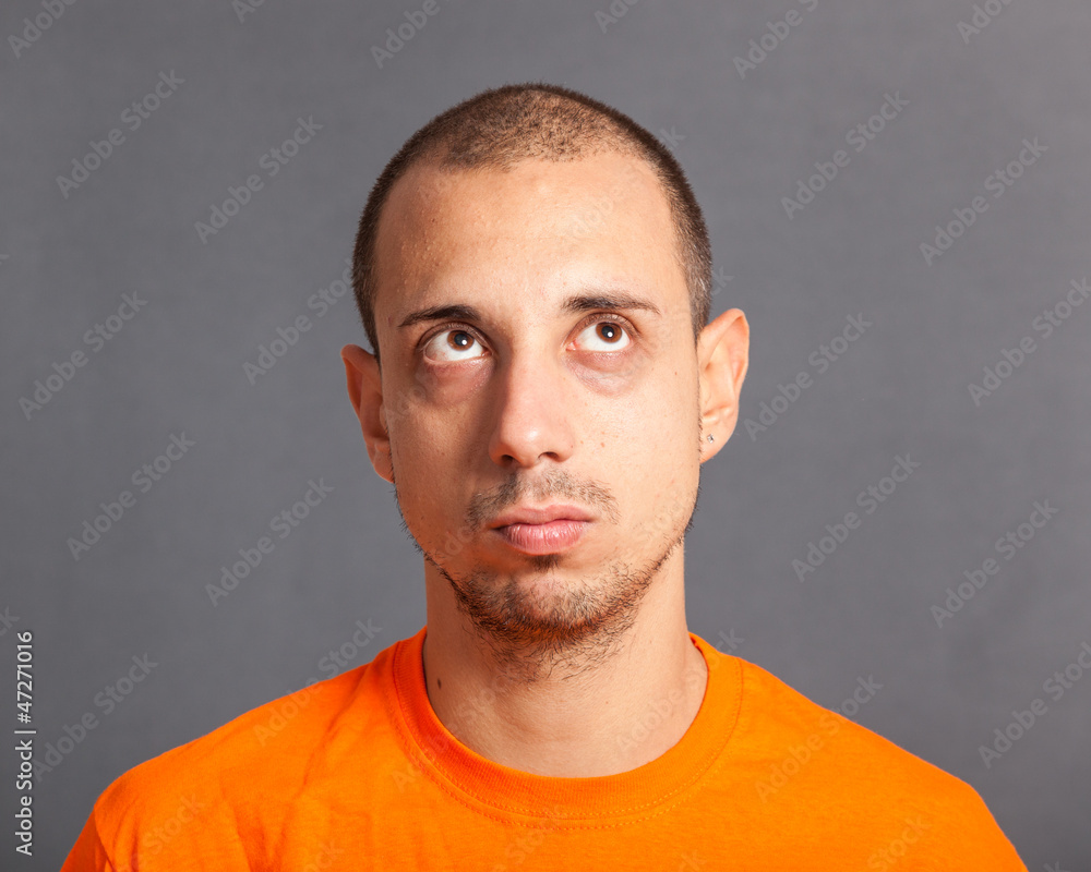 Fototapeta premium Young Man Portrait on Grey Background