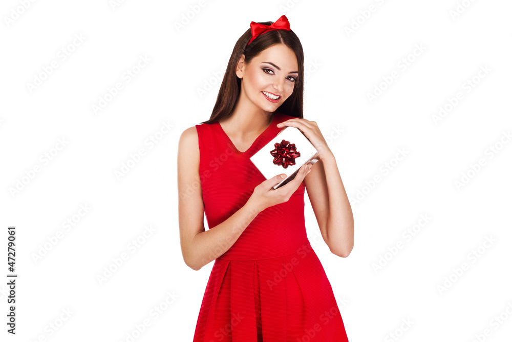 christmas picture of elegant woman holding a present christmas picture of elegant woman holding a present