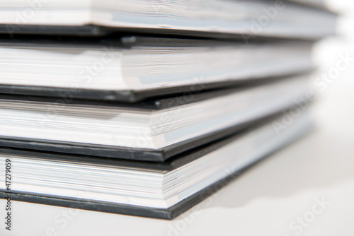 pile of books on white background