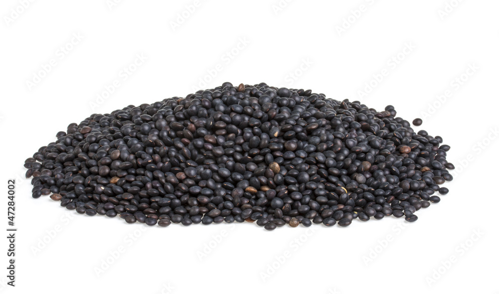 Heap of black lentil isolated on white Heap of black lentil isolated on white