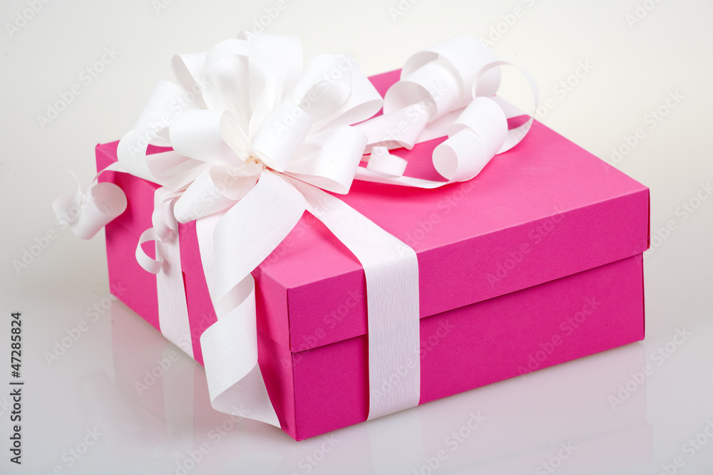pink gift box with white ribbon and bow pink gift box with white ribbon and bow