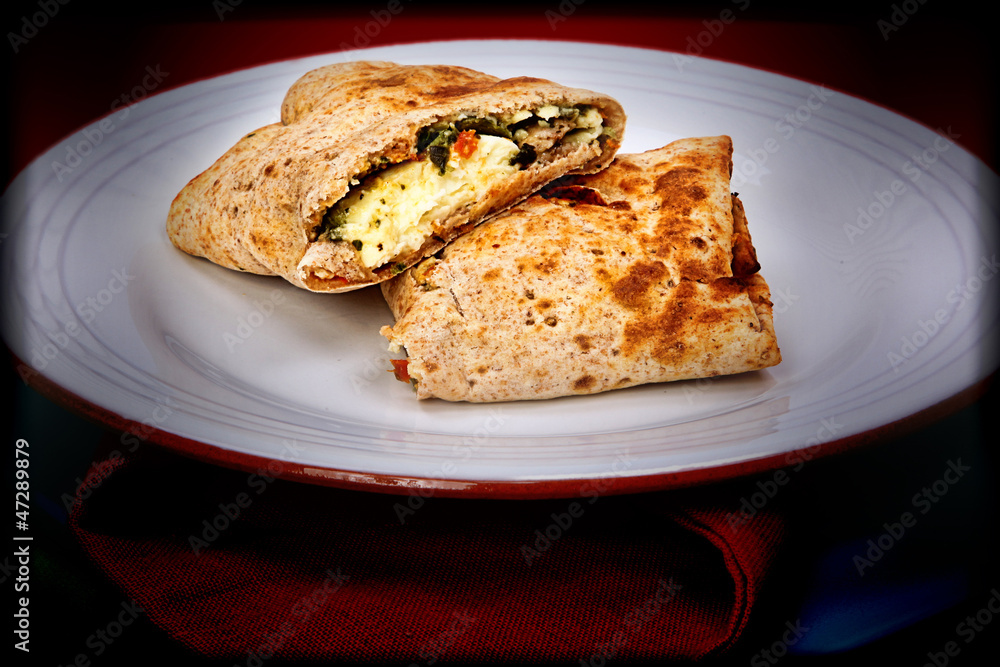 Late Night Feta Egg Wrap Snack on Plate and Napkins Late Night Feta Egg Wrap Snack on Plate and Napkins