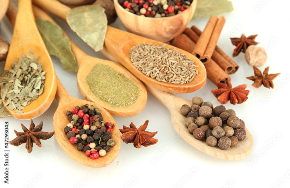 wooden bowls and spoons with spices isolated on white wooden bowls and spoons with spices isolated on white