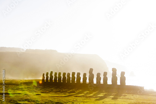 Fifteen standing moai at sunrise in Easter Island