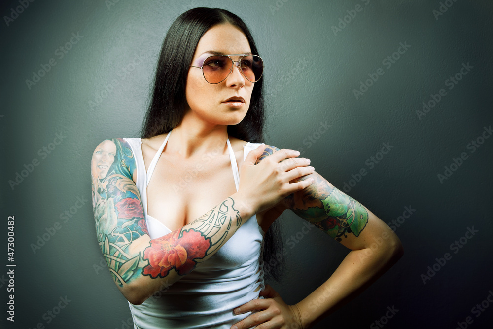 Beautiful sexy glamorous girl with tattoos Stock Photo | Adobe Stock