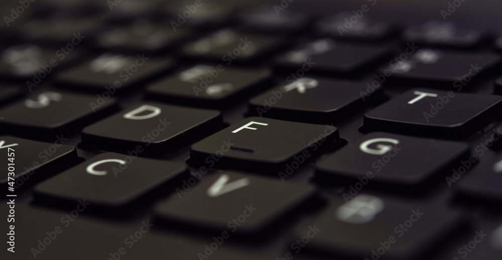 Closeup of black laptop keyboard Closeup of black laptop keyboard