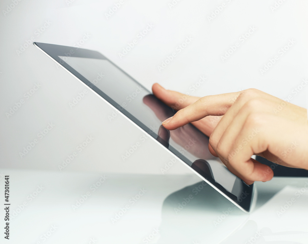 touch pad in hand touch pad in hand