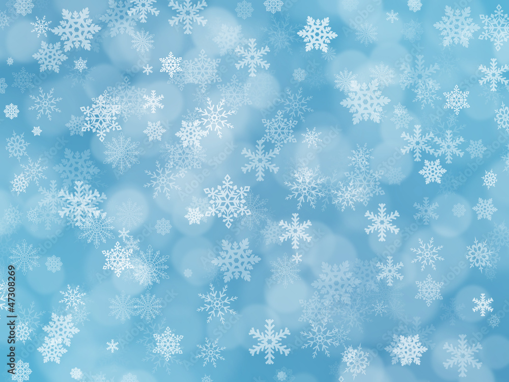Blue winter background with snowflakes and boke effect