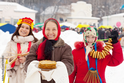  woman with pancakes during  Shrovetide