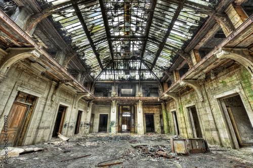 Beautiful glass roof inside the hall of an abandoned central off