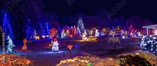 Fototapeta Naklejka Na Ścianę i Meble -  Village in christmas lights, panoramic view