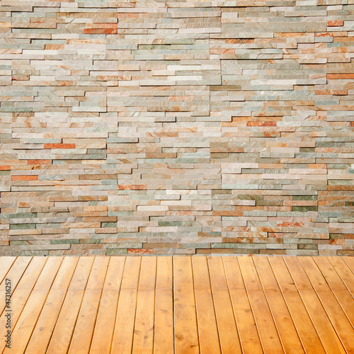 empty interior room with rock wall background