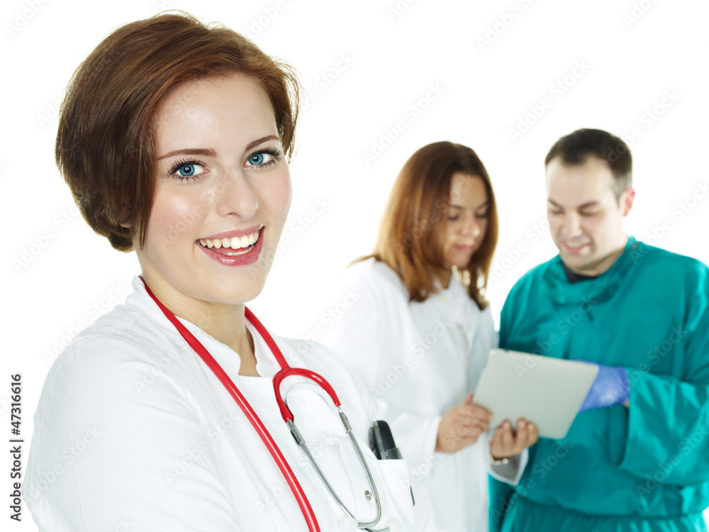 Team of doctors, surgical team with touchpad Team of doctors, surgical team with touchpad