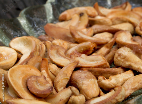 close up of cashew nuts in glass dish