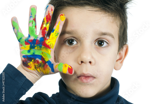 Boy hand painted with colorful paint