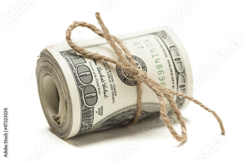 Roll of One Hundred Dollar Bills Tied in Burlap String on White