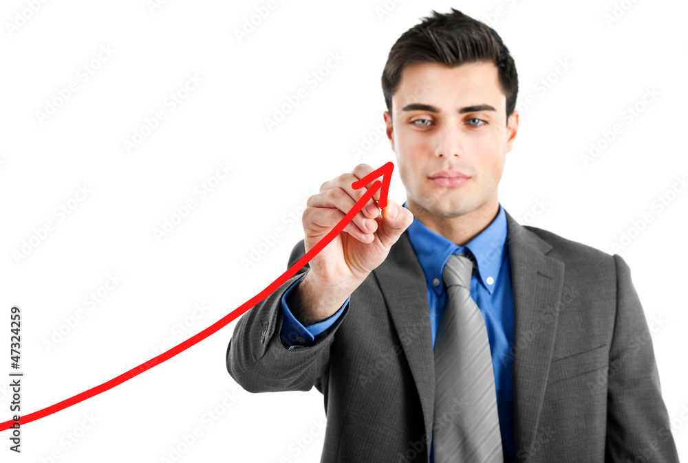 Businessman drawing a growing business graph isolated Businessman drawing a growing business graph isolated