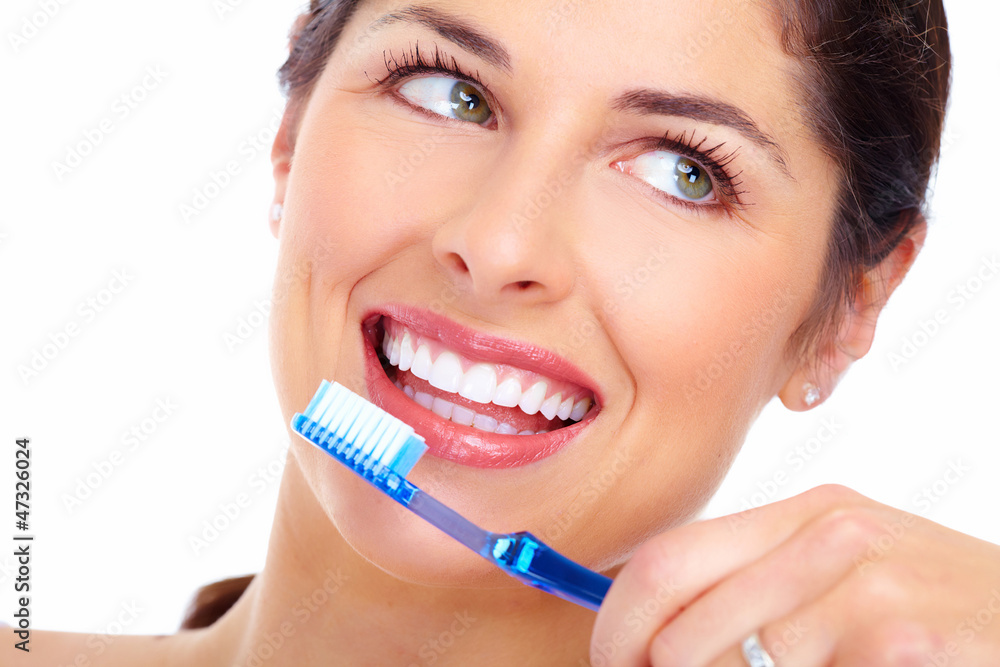 Beautiful woman smile with a toothbrush. Beautiful woman smile with a toothbrush.