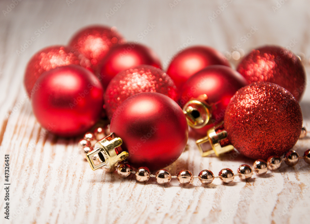 christmas baubles on rustic wooden background christmas baubles on rustic wooden background