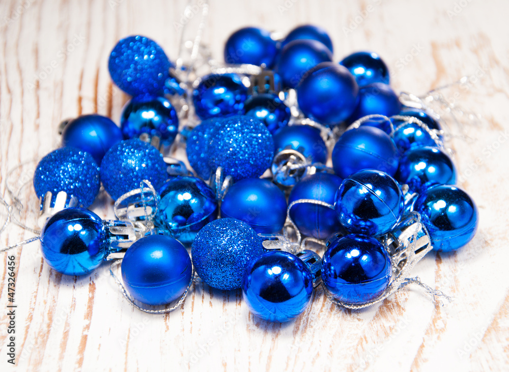 christmas baubles on rustic wooden background christmas baubles on rustic wooden background