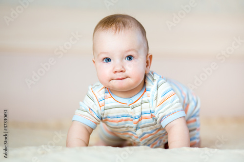 cute crawling baby boy indoors