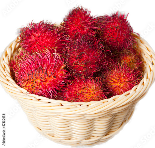 a basket of fresh rambutan