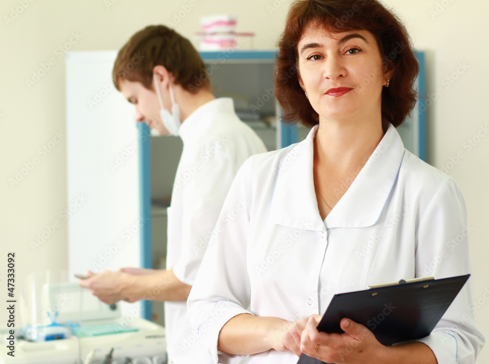 Obraz premium nurse with stethoscope and clipboard