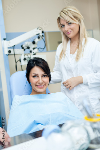 Female patient with dentist
