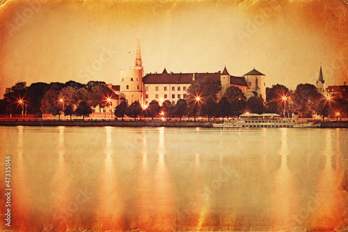 Retro style panorama of old Riga
