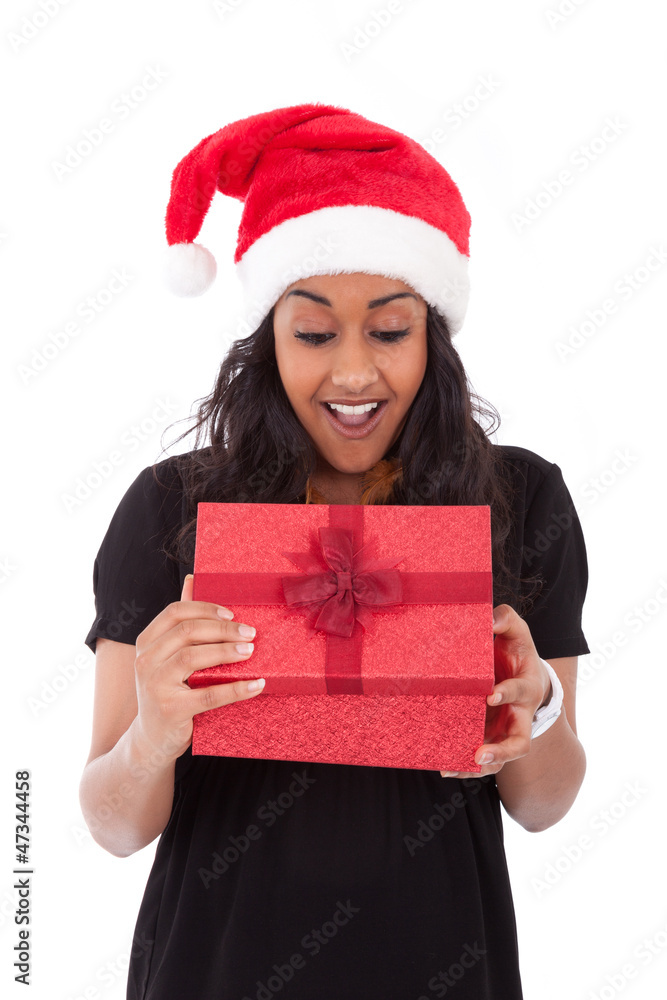 Young African American woman opening a gift box Young African American woman opening a gift box