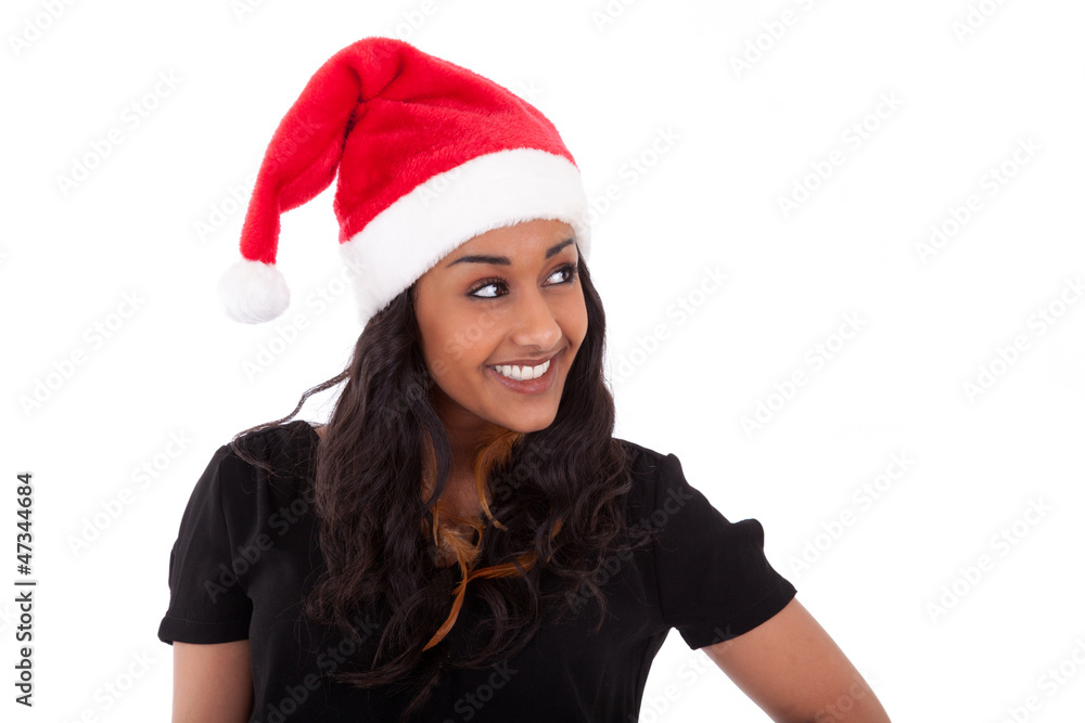 Young African American woman wearing a santa hat Young African American woman wearing a santa hat