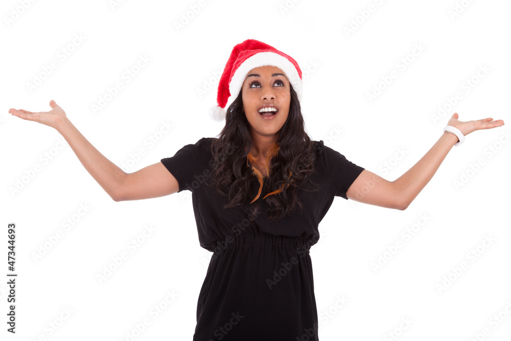 Young African American woman wearing a santa hat Young African American woman wearing a santa hat